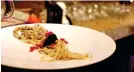  ??  ?? LINE OF LUXURY. Cold Angel Hair Pasta Salad with Truffle Bites and Caviar