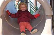  ?? MARIAN DENNIS — MEDIANEWS GROUP ?? Kids were all smiles Wednesday as they slid down slides, climbed on the equipment and took turns on the swings of the newly opened all-abilities playground in Phoenixvil­le.