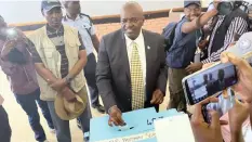  ?? | Reuters ?? BOTSWANA’S President Mokgweetsi Masisi casts his vote at his home village of Moshupa, in the Southern District of Botswana, this week.