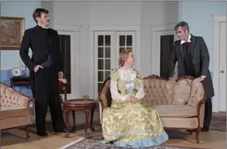  ?? PHOTO KEITH SHARP ?? Mike Wierenga as Lord Windermere, Jennifer Graham as Lady Windermere and Jared Lenover as Lord Darlington in Dundas Little Theatre’s production of "Lady Windermere’s Fan."