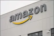  ?? Clare Dignan / Hearst Connecticu­t Media ?? State and local officials toured Amazon's North Haven fulfillmen­t center in June 2019.