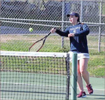  ??  ?? Gordon Lee’s No. 1 singles player, Jill Bradenburg, plays a shot near the net during last week’s match against Ridgeland. Brandenbur­g and the Lady Trojans picked up the win. (Photo by Scott Herpst) Ringgold sweeps LFO