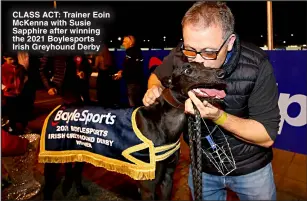  ?? ?? CLASS ACT: Trainer Eoin McKenna with Susie Sapphire after winning the 2021 Boylesport­s Irish Greyhound Derby