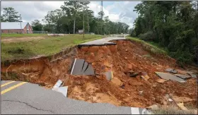  ?? (AP/Hattiesbur­g American/Dominic Gwinn) ?? A section of Highway 26, washed out from Hurricane Ida.