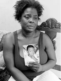  ?? PHOTO BY NATHANIEL STEWART ?? Annika Davidson, grieves the loss of her six-year-old son, Oshane Banton who went missing and was later found in sewage in a pumphouse in Lionel Town, Clarendon.