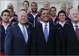  ?? SUSAN WALSH — THE ASSOCIATED PRESS FILE ?? President Barack Obama, flanked by Vice President Joe Biden and former President Bill Clinton meet with the U.S. World Cup soccer team at the White House in May 2010.