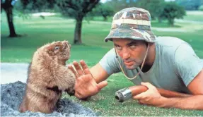  ?? ARCHIVE PHOTOS/GETTY IMAGES ?? Carl Spackler (Bill Murray) and the infamous golf course gopher were something of a movie mulligan, a new book reveals.