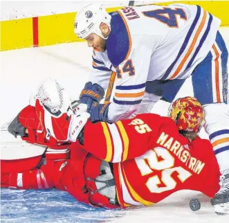  ?? USA TODAY SPORTS ?? Calgary Flames goaltender Jacob Markstrom (25) and Edmonton Oilers right wing Zack Kassian (44) collide during the second period in game one of the second round of the 2022 Stanley Cup playoffs at Scotiabank Saddledome.
