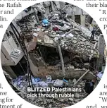  ?? ?? BLITZED Palestinia­ns pick through rubble