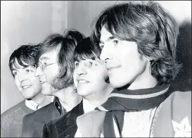  ?? AP/FILE ?? This file photo shows The Beatles, from left, Paul McCartney, John Lennon, Ringo Starr and George Harrison.