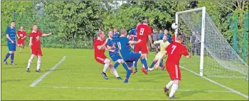  ?? Match report and photos: Derek Black ?? Donald Campbell, No 9, heads wide during last Saturday’s 5-1 win over North Glasgow Colts.