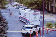  ?? ROBERTO E. ROSALES/JOURNAL ?? Albuquerqu­e police investigat­e after a woman’s body was found Friday morning at a hotel near the Sunport.