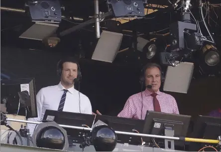  ?? MORRY GASH - THE ASSOCIATED PRESS ?? In this Sept. 24, 2017, file photo, Tony Romo and Jim Nantz work in the broadcast booth before an NFL football game between the Green Bay Packers and the Cincinnati Bengals in Green Bay, Wis.