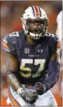  ?? BRYNN ANDERSON — THE ASSOCIATED PRESS ?? Auburn linebacker Deshaun Davis reacts after a play against Alabama during the second half of the Iron Bowl NCAA college football game, Saturday in Auburn, Ala. Auburn won 26-14.