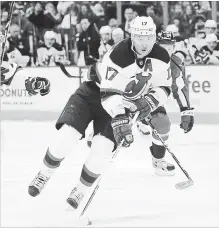  ?? TNS FILE PHOTO ?? Ilya Kovalchuk (17) works the puck against the Capitals in Washington, D.C., on Feb. 21, 2013, during his days with the New Jersey Devils. Kovalchuk has opted to return to the NHL with the Los Angeles Kings.