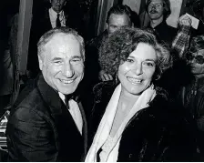  ?? ?? Left: Brooks performs on the first-ever broadcast of The Tonight
Show Starring Johnny Carson, October 1962. Right: Brooks and Anne Bancroft, his wife of 41 years, in the 1990s.