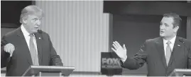  ??  ?? Republican presidenti­al candidates Donald Trump, left, and Sen. Ted Cruz during Thursday evening’s debate in North Charleston, South Carolina.