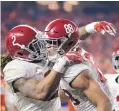  ?? AP FILE ?? Alabama tight end O.J. Howard, right, caught five passes for 208 yards and two touchdowns in last season’s CFP championsh­ip.