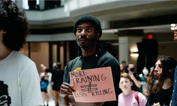  ?? Photograph: Megan Varner/Reuters ?? People protest against ‘Cop City’ at city hall in Atlanta, Georgia, on 15 May.