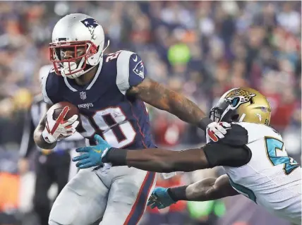  ?? GETTY IMAGES ?? James White of the New England Patriots, a former Wisconsin standout, has taken his record-setting performanc­e in last season’s Super Bowl in stride.