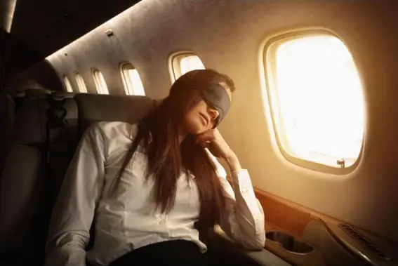  ??  ?? Cocooning yourself with an eye mask and ear plugs helps prepare for a new time zone (Rex)