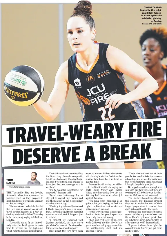  ?? Picture: ZAK SIMMONDS ?? TAKING CHARGE: Townsville Fire point guard Kelly Wilson in action against the Adelaide Lightning on Sunday.