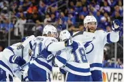  ?? AP ?? The Tampa Bay Lightning celebrate a goal during the third period against the New York Rangers in Game 5 of the Eastern Conference Finals, Thursday in New York.