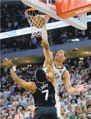  ?? GETTY ?? Brook Lopez dunks for two of his 29 points as Bucks take Game 1 from Tornoto.