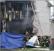  ??  ?? First responders inspect the scene of Saturday’s deadly plane crash.