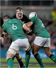  ?? GETTY IMAGES ?? Rory Best and Peter O’Mahony combine to tackle Brodie Retallick during Ireland’s win over the All Blacks last month.