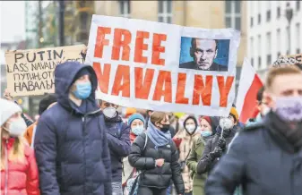  ?? Omer Messinger / Tribune News Service ?? Some 2,500 supporters of Russian opposition politician Alexei Navalny marched in protest in Berlin in January to demand his release from a Moscow prison.