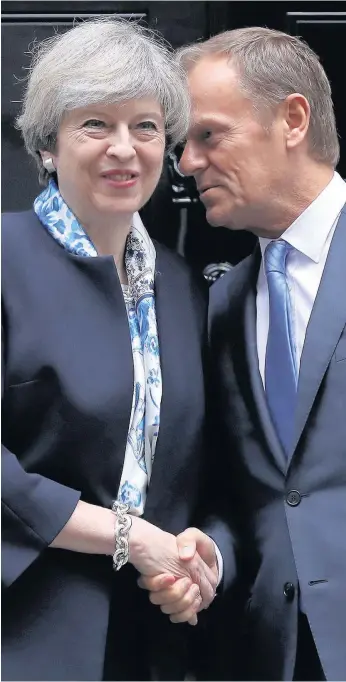  ??  ?? > Theresa May greets President of the European Council Donald Tusk at No.10