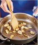  ??  ?? To ensure even browning and avoid burning, constantly stir the whole garlic cloves in the pan.