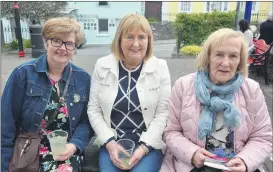  ?? (Pic: John Ahern) ?? L-r: Mary Ahern-Casey from Kilbehenny in the company of Teddy Kerins and Mai Geraghty at last Saturday’s exhibition launch in Market House Craftworks, Cappoquin.