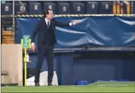  ??  ?? Villarreal’s Spanish coach Unai Emery gestures during the Europa League semi-final first leg against Arsenal at the Ceramica Stadium in Vila-real on April 29.