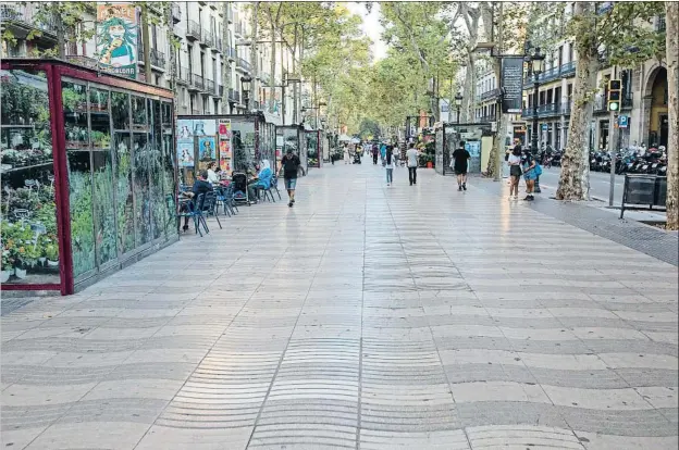  ?? MANÉ ESPINOSA ?? La zona cero. Los turistas han desapareci­do de la Rambla, por eso algunas voces reclaman aprovechar el momento para impulsar su reforma