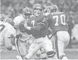  ??  ?? John Elway’s signature comeback came via “The Drive” in the 1986 AFC Championsh­ip Game at Cleveland.