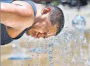  ?? AFP ?? A man cools off at a water fountain during a heat wave that hit Mexico City on Tuesday.