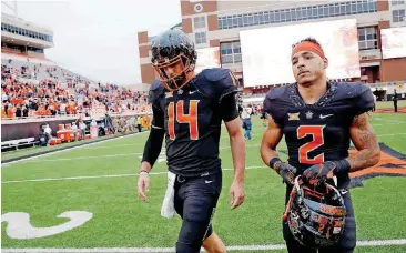  ?? [PHOTO BY SARAH PHIPPS, THE OKLAHOMAN] ?? After winning his first three starts as Oklahoma State’s quarterbac­k, Taylor Cornelius and the Cowboys are 1-3 in Big 12 play.