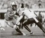  ?? Brian Bahr / Getty Images ?? Chuba Hubbard was held to 35 yards in the first half, but he scored the only TD for Oklahoma State.