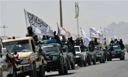  ?? Photograph: Javed Tanveer/AFP/Getty Images ?? Taliban fighters celebrate the military takeover of Afghanista­n. ‘Their return to power is just one example of how this heavy-handed antiterror strategy failed.’