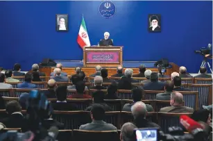  ?? (Official president’s website/Reuters) ?? IRANIAN PRESIDENT Hassan Rouhani addresses reporters during a news conference in Tehran yesterday.