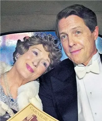  ??  ?? Florence Foster Jenkins (Meryl Streep) ist die „Diva der falschen Töne“, ihr Mann (Hugh Grant) unterstütz­t ihren Traum von der großen Bühne – 20.15 Uhr, Arte.