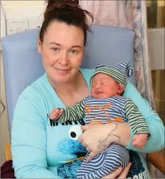  ??  ?? Mum Jennifer O’Brien from Clongeen with baby Rhys who was born at 7.31 a.m. on New Year’s Day.