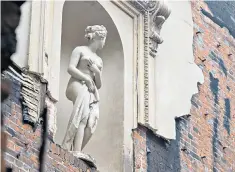  ??  ?? Still standing: one of the statues in Clandon Park’s Marble Hall in the wake of the fire