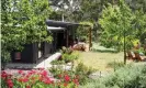  ?? Photograph: Natalie Parletta ?? Kathy Menzel’s energy-efficient off-grid home in the Adelaide Hills.