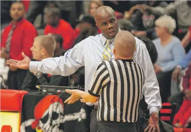  ?? | MIKE MANTUCCA/FOR SUN-TIMES MEDIA ?? H-F girls coach Anthony Smith, whose team was barred from the state playoffs, was suspended indefinite­ly.