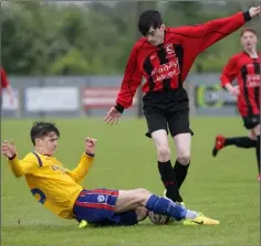  ??  ?? James Doyle of Curracloe challenges Matthew McCabe.