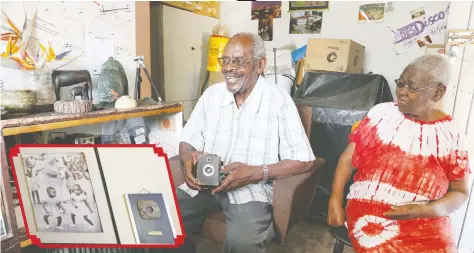  ??  ?? CAMERA AND FILM . . . Bester Kanyama goes down memory lane with the help of his wife of 64 years, Hilda. To Bester’s right is his collection of cameras from the first one he got in 1947. (Inset) THE TWIST . . . the award-winning picture hangs on the walls of Kanyama’s lounge alongside the trophy