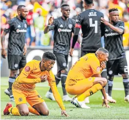  ?? Picture: GALLO IMAGES/SYDNEY SESHIBEDI ?? REDEMPTION TIME: Triumphant Pirates players are jubilant as Kaizer Chiefs players look dejected during their last match. The Soweto giants will lock horns again on Saturday.